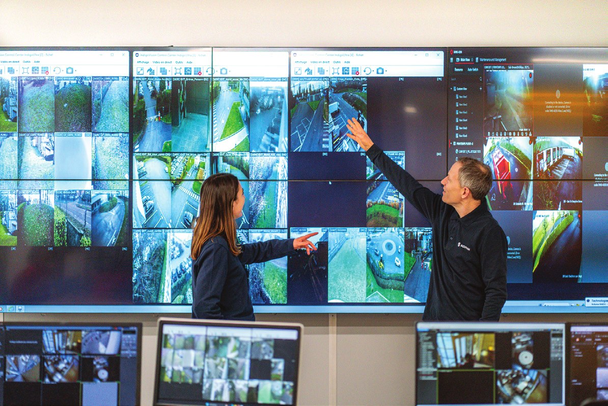 Scutum Digital operators monitoring live camera feeds on a video wall